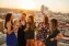 Young woman celebrating at a roof top in Madrid